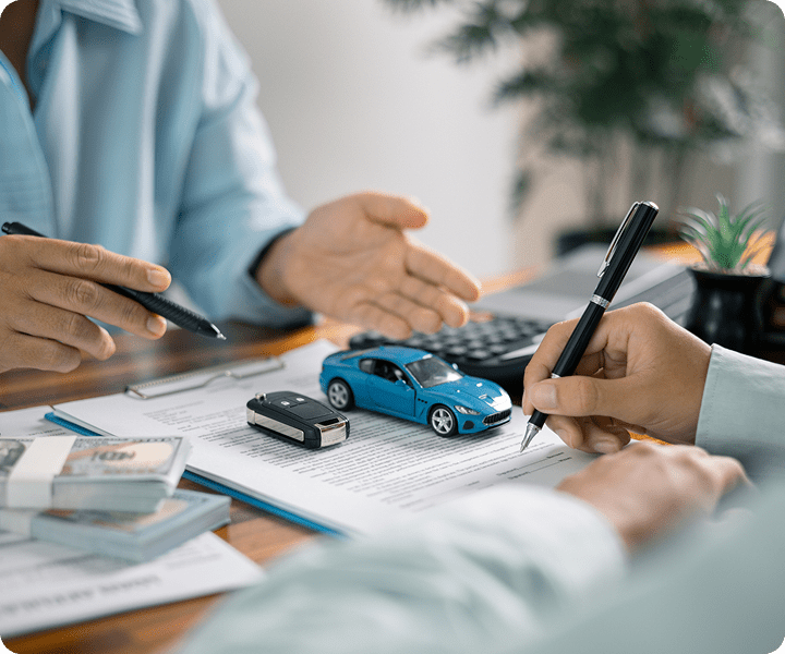 Car insurance discussion with toy car